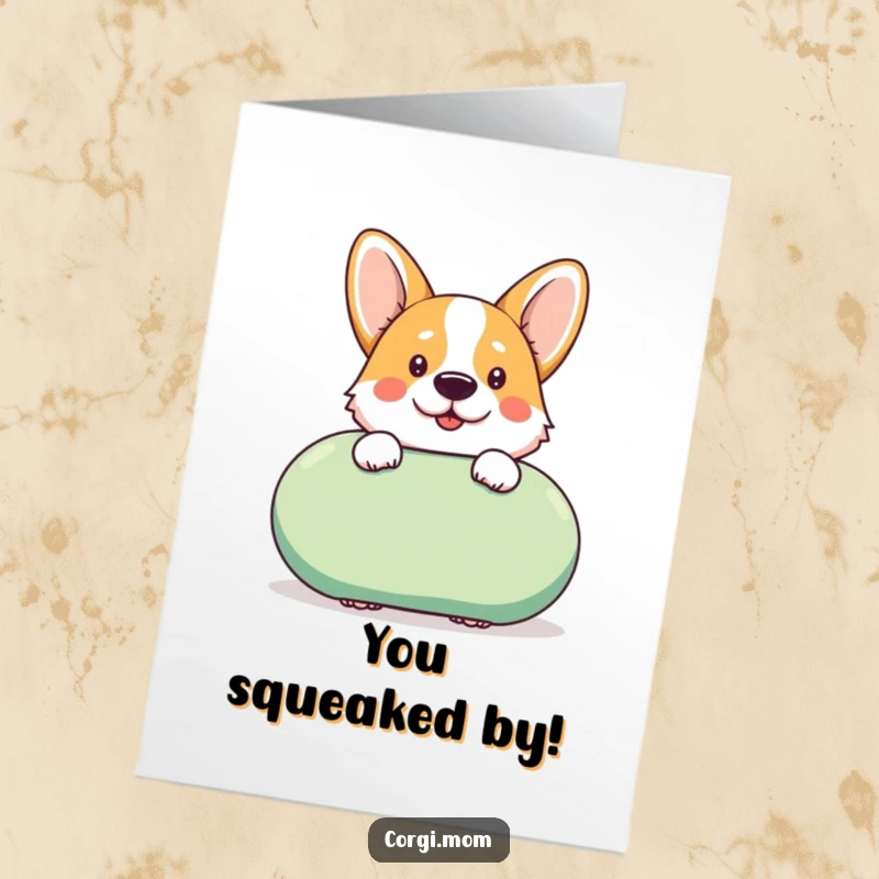 Funny Free Printable Congratulations Card: A kawaii Corgi peeks cheekily from behind a giant squeaky toy, celebrating with mischief.