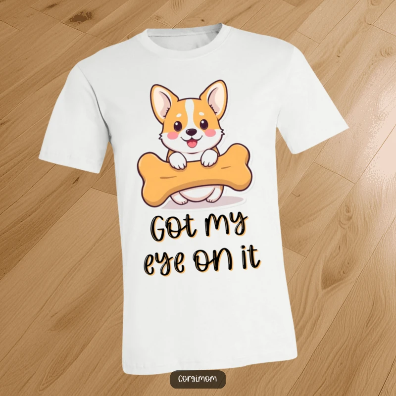 Funny Kawaii Corgi T-Shirt showing a cute Corgi dog peeking from behind a giant bone, embodying playful puppy antics.