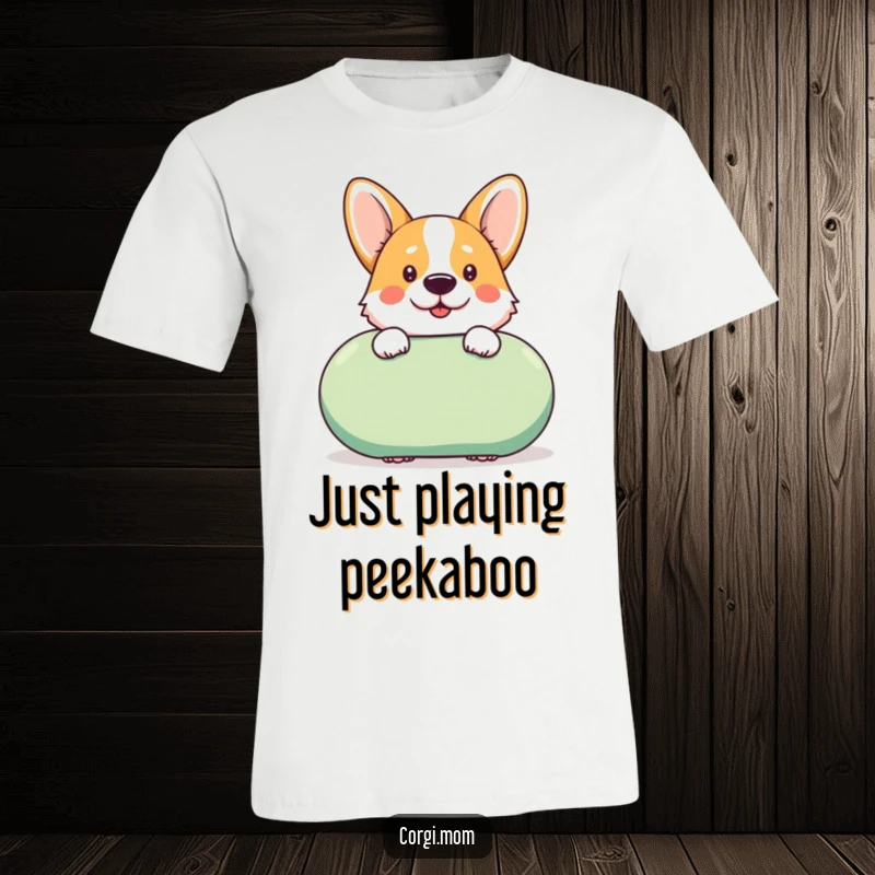 Funny kawaii Corgi peeks cheekily from behind a giant squeaky toy, adding humor and charm to this graphic t-shirt.